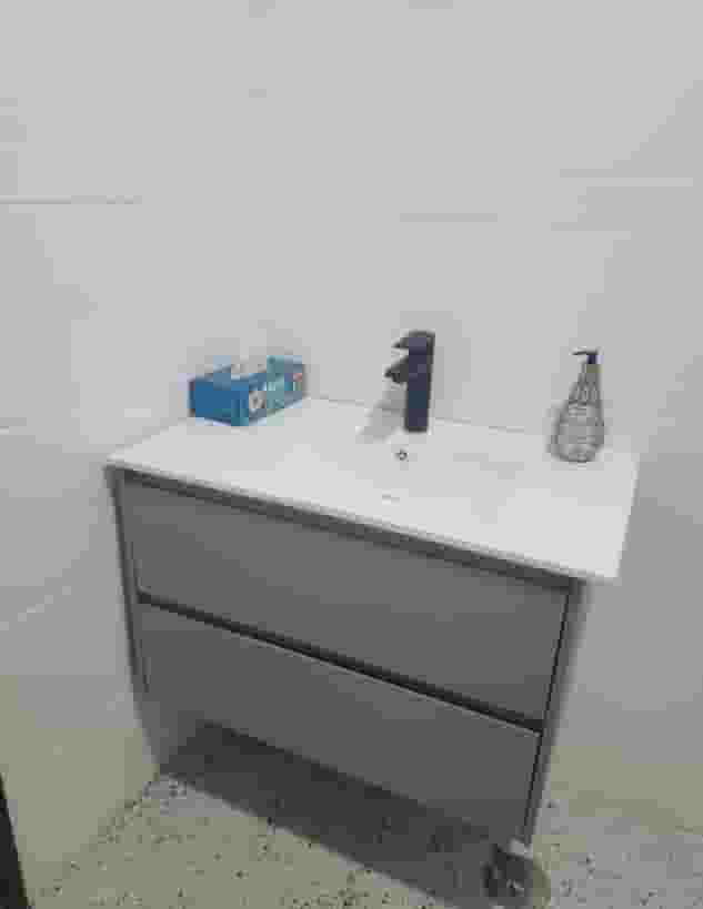 For sale a gray Arabic laundry